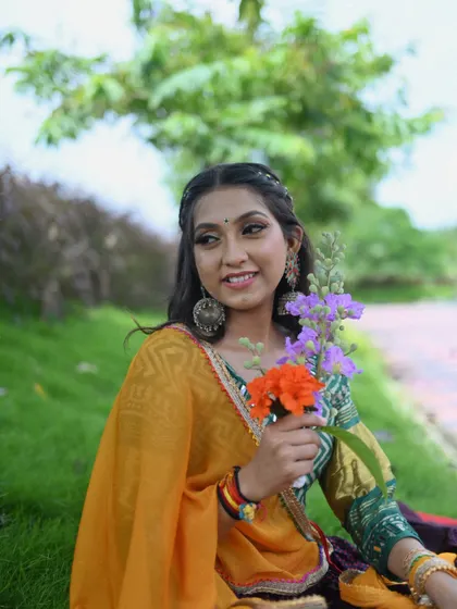 A candid moment from my Garba themed photoshoot. The colors, the accessories, and the setting all come together to celebrate the beauty of Gujarati culture.