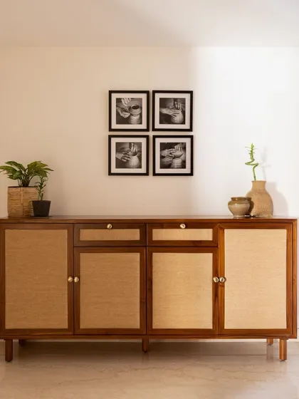 This custom foyer unit was designed to meet a client's specific storage needs, with dedicated space for footwear, umbrellas, keys, and sports equipment. It proves that practical furniture can also be beautiful.