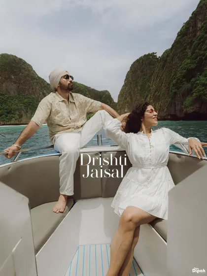 A relaxed and stylish shot of a couple on a speedboat in Thailand. I focus on capturing both epic and candid moments that reflect your personality during your destination shoot.