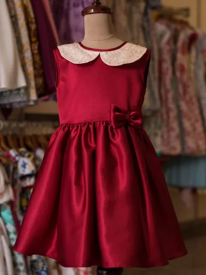 A duplicate of the classic red satin dress, perfect for showing consistency in my collection. The sparkly collar and sweet bow are signature details.