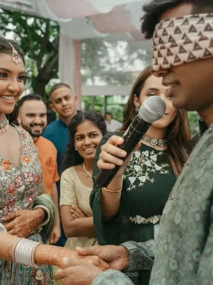 Fun and games are an essential part of a Mehendi ceremony. We organized this playful blindfold game for Hema and Karthik, creating laughter and sweet memories for the couple and their guests.