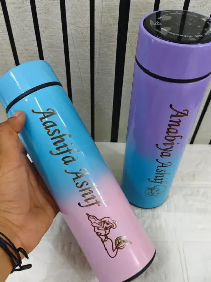 These dual-tone temperature bottles feature a beautiful color gradient and can be personalized with a name and a charm, like the mermaid shown here.