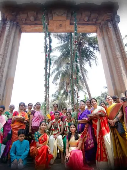 A grand family portrait taken at an outdoor wedding venue. We ensure that we capture these important group photos, preserving the memory of everyone who celebrated with you.