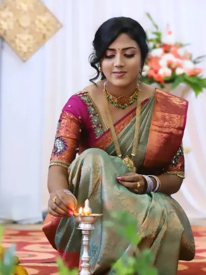 A candid photo of Sneha during her engagement ceremony. The makeup looks soft and beautiful even in action shots, ensuring you look your best throughout the event.
