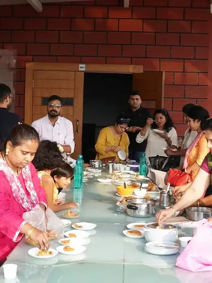 Food brings everyone together. A candid shot from our chef meet-up, where our team and home chefs share a meal and celebrate their collective success.