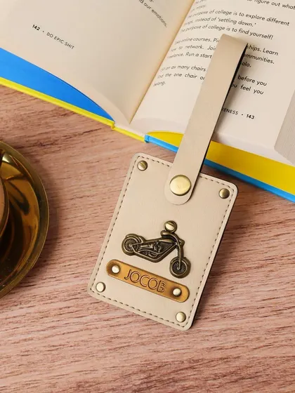 Travel in style with this personalized luggage tag made from high-quality vegan leather. It's customized with the name "Jacob" and a cool motorcycle charm, making it easy to spot your bag.