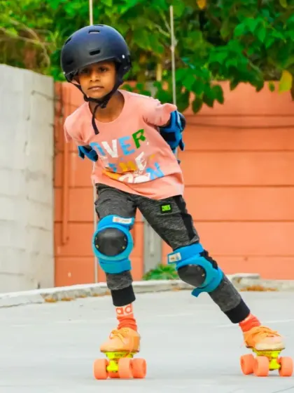 Another one of our young skaters, fully geared up and ready to roll. We welcome kids of all skill levels to our summer coaching.