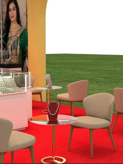 A duplicate of image 8, this angle shows the flow within the stall. The placement of chairs and small tables creates pathways for visitors to move around, while ensuring there is enough space for showcasing jewelry on display stands.