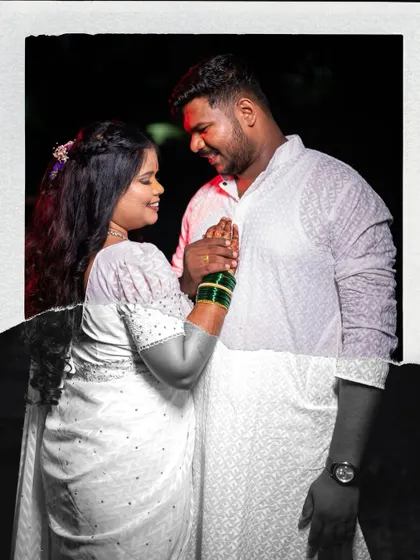 A creative portrait with a torn-paper effect, blending a color and black-and-white feel. This artistic edit adds a unique, modern touch to a classic couple pose.
