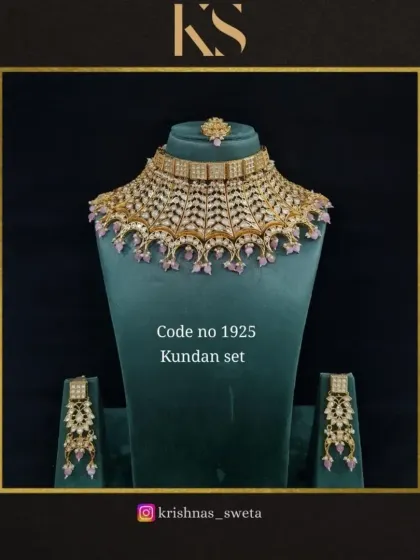 An exclusive Kundan bridal set with a delicate design and soft lavender-colored beads. This is a perfect choice for a modern, romantic bridal look.