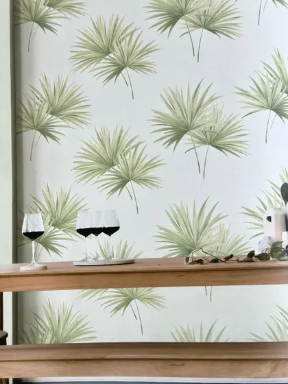 This tropical leaf wallpaper is perfect for creating a fresh and airy bar or dining area. The simple, clean design of the palm leaves on a white background adds a touch of paradise to your home.