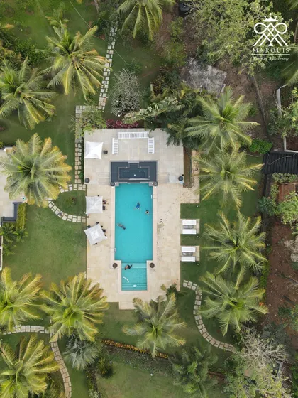 This is your base of operations. The pool and lounge area serve as a crucial zone for recovery and team strategy sessions after a hard day of training.