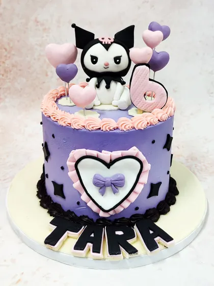 We embrace the cuter side of goth with this adorable Kuromi cake. The popular Sanrio character is surrounded by hearts on a lovely lilac cake, blending her edgy style with sweet pastels for a unique and charming birthday theme.
