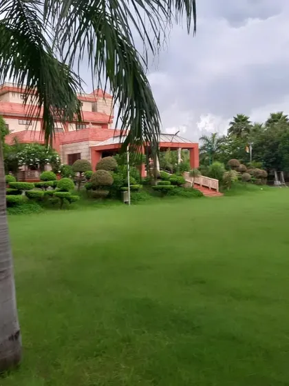 A new farmhouse venue in Noida perfect for your wedding and events. The lush green lawn and beautiful property provide a serene escape within the city for your celebrations.