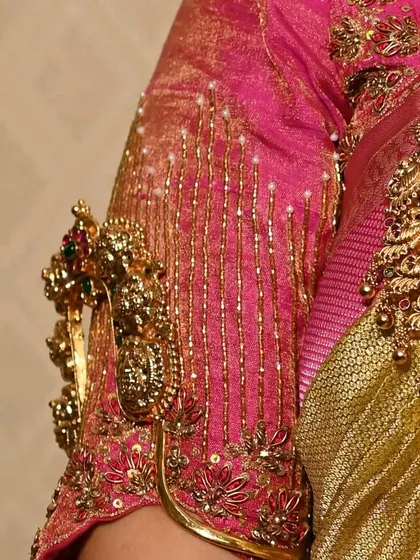 The arm cuff, or vanki, is another beautiful element of a traditional bridal look. This piece features intricate carvings to match the main necklace.