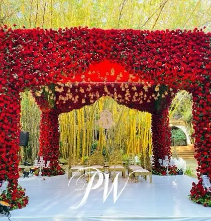 You can never go wrong with classic romance. We drenched this entire mandap in thousands of fresh red roses, creating a breathtaking floral masterpiece that was both dramatic and incredibly romantic for this Muhurtham ceremony.