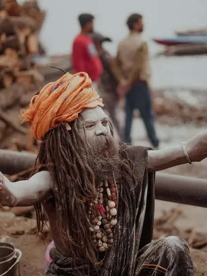 Portraits of Aghori sadhus at the ghats, their bodies covered in ash. These images document the lives of those who renounce worldly attachments in their pursuit of spiritual enlightenment.