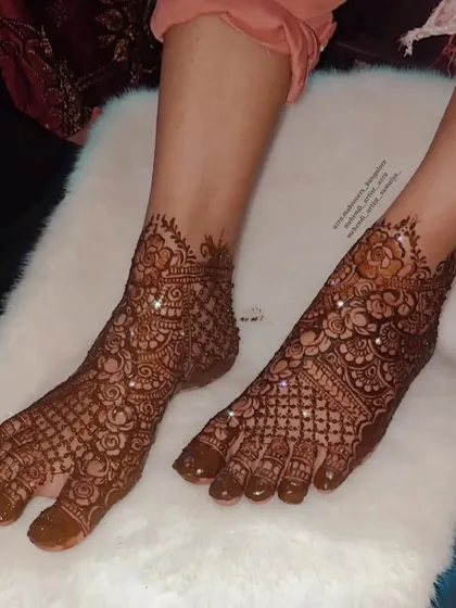 A full view of a sparkling bridal foot design, perfect for catching the light as you walk.