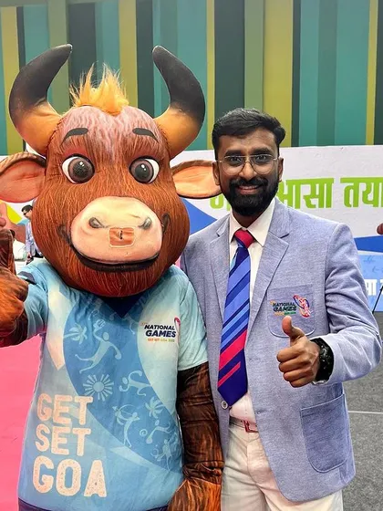 Another photo with the mascot, capturing the vibrant spirit of the National Games.