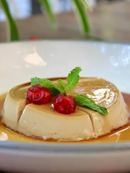Our vegan caramel pudding is a weekend special that our customers love. It's made with creamy almond mylk and coconut cream, sweetened with jaggery syrup for a rich, authentic flavor.