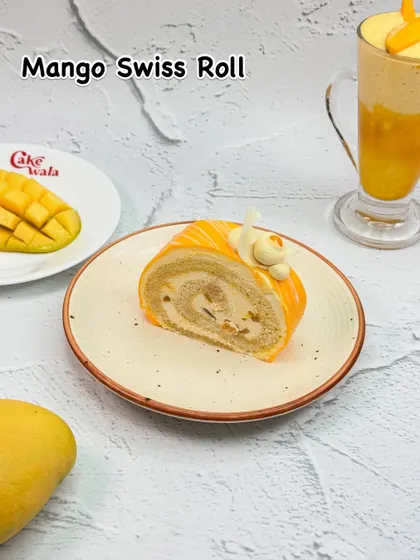 A delightful swirl of fun, our Mango Swiss Roll is a fluffy sponge cake rolled with a creamy mango filling. It's a light and elegant treat that captures the essence of summer.