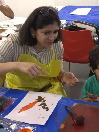 More creative exploration at the Colourful Connects workshop. Each family brings their unique flair to the art they create.