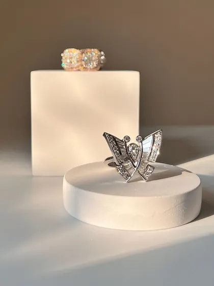 A closer look at the stunning diamond butterfly ring, crafted with baguette and round diamonds for a unique and whimsical design.