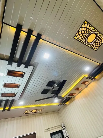 Yeh ek aur modern geometric design hai. Ismein alag-alag shapes aur lighting elements ka istemaal karke ek dynamic look create kiya gaya hai.