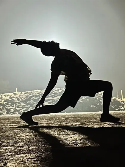 Last month of the year. 1% everyday. 1 step everyday for our health and wellness. A silhouette of a variation of Parsvakonasana.
