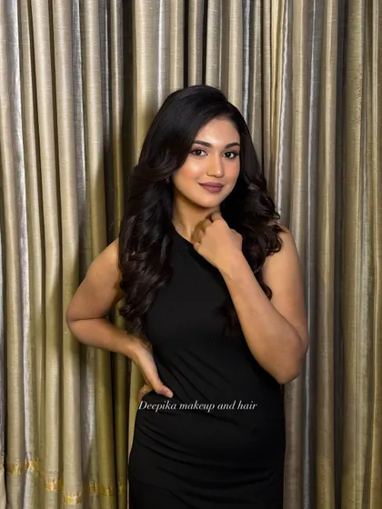 Another angle of this beautiful Western glam look. The model's smile shows her confidence, and the makeup enhances her natural features perfectly.