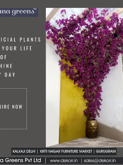 My artificial plants can make your life full of sunshine every day. This tall, purple flowering plant in a golden vase is a perfect example of how to add a pop of color and elegance to any corner.