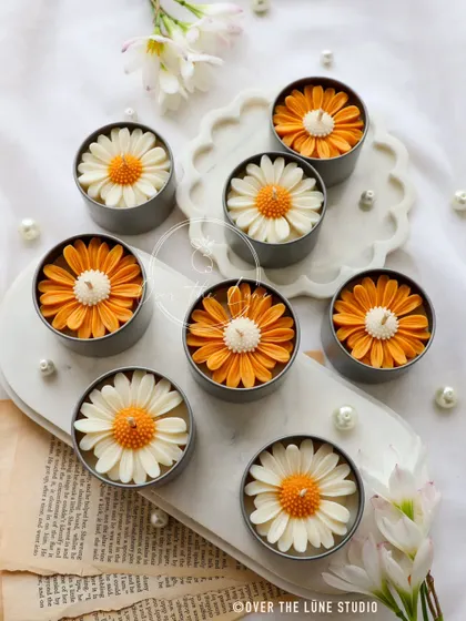 My Daisy Mini Candles are available in both classic white and cheerful orange. They look so lovely arranged together.