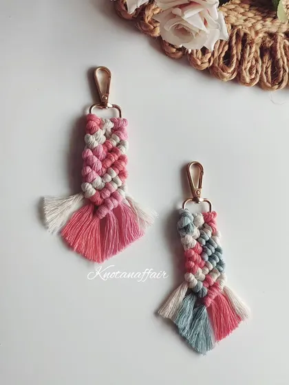 I love these pastel shades. Here are some macrame keychains in pink, grey, and blue combinations. They can also be used as cute bag charms.