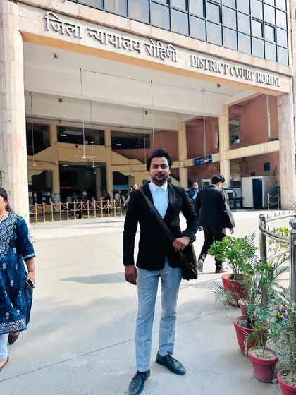 Pictured at the entrance of District Court Rohini. My presence here is a daily routine as I handle various family law cases.
