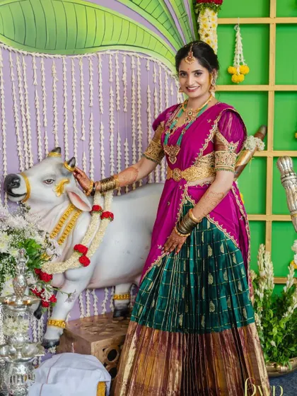 A beautiful portrait of a bride during her wedding rituals. Her makeup is traditional and flawless, designed to look perfect both in person and in photographs.