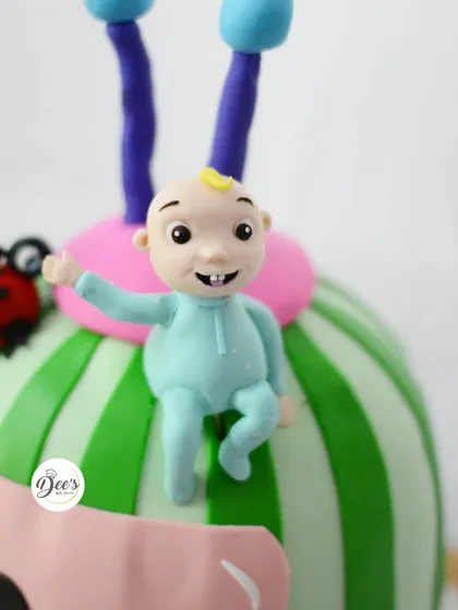 A close-up of the hand-sculpted JJ character, capturing his happy expression.