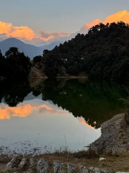 The stunning reflection of sunset clouds in Deoria Tal lake. We time our treks to give you the best chance of witnessing such breathtaking natural beauty.