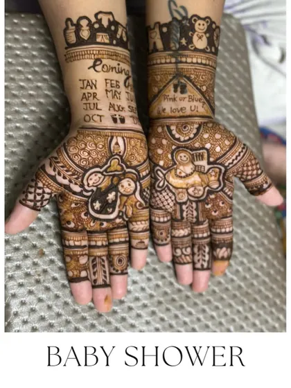 'Pink or Blue, We Love You'. A very cute baby shower mehendi with a calendar marking the due date and adorable baby motifs.