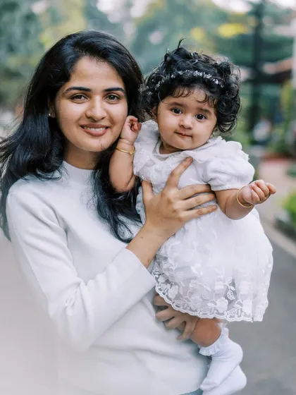 A sweet portrait of a little girl with her favorite auntie, showing the special bonds within the extended family.