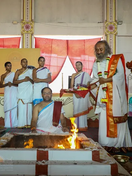 I am participating in the Rama Tarak Homa, a fire ceremony dedicated to Lord Rama. This ritual is performed to invoke victory, peace, and righteousness.