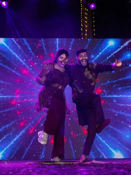 Pure energy and fun on the dance floor as the couple shows off their moves during the Sangeet night.
