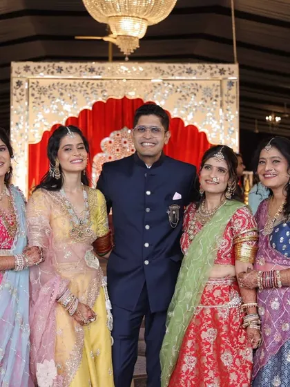 A lovely family portrait from a wedding event. We had the pleasure of designing colorful, coordinated lehengas for the women, each featuring unique embroidery and detailing.