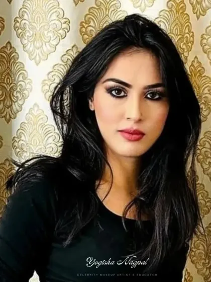 The same student, looking confidently at the camera. Learning to do your own makeup is a skill that empowers you for any occasion.