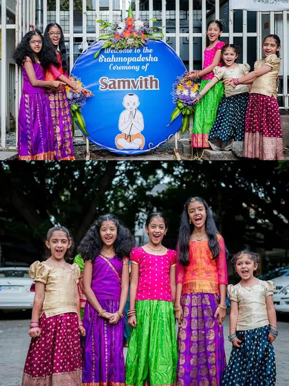 A group of young girls in colorful traditional wear, posing happily at a relative's Upanayanam (thread ceremony).
