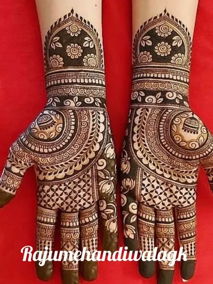 This is a very traditional, full-coverage design, often called a 'bhara hua' mehandi. It uses mandalas, checks, and floral patterns to leave very little skin showing, resulting in a very deep and rich stain.