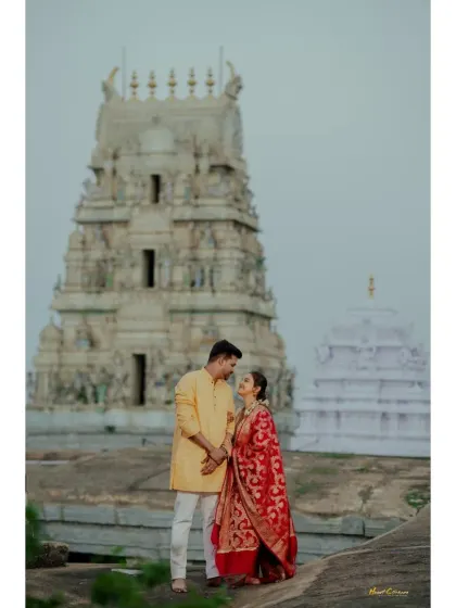 A beautiful pre-wedding shoot set against the backdrop of a traditional temple gopuram. I love blending cultural heritage with modern romance.