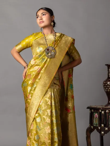 I provided creative styling and art direction for this Zari Jaipur shoot, featuring a stunning handloom Banarasi saree. I paired it with a statement tribal necklace and an embroidered bag to create a rich, artistic, and traditional look.