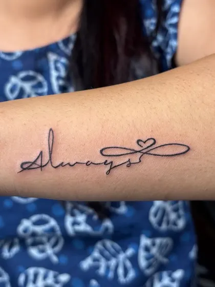 The word "Always" combined with an infinity symbol and a heart. A simple, elegant, and timeless message of love, done in a flowing script.