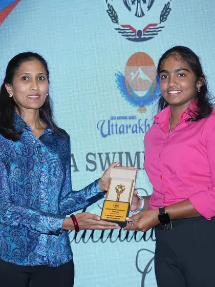 A moment of pride as our water polo player is honored for her achievements.