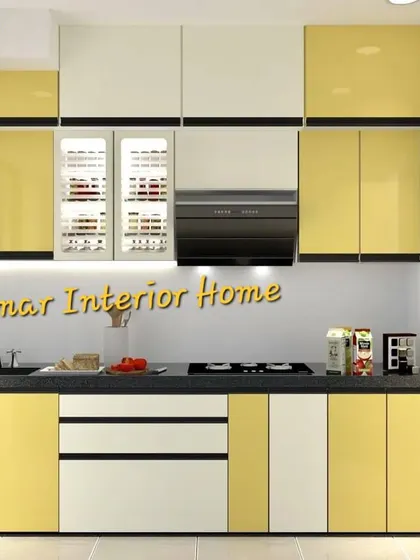 A yellow and white kitchen with a black countertop and chimney. The combination of colors creates a modern and energetic cooking space.